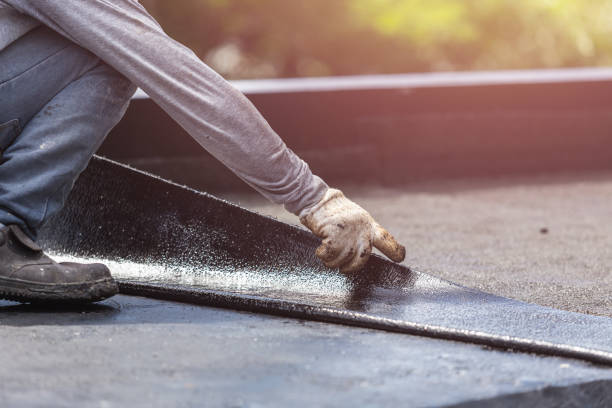 Professional Waterproofing technician working in Fenton, MI
